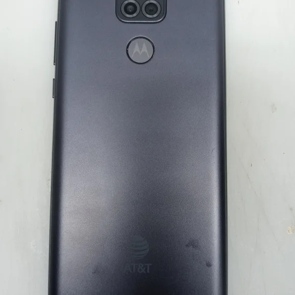 A Motorola G Play phone with case